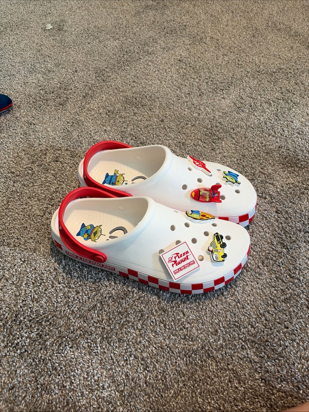 White and Red Clog Shoes with Character Accents